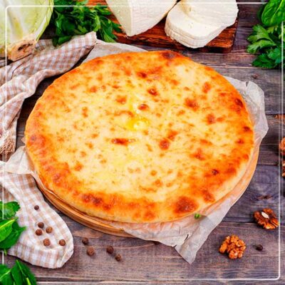 Пирог осетинский с капустой, сыром и грецким орехом